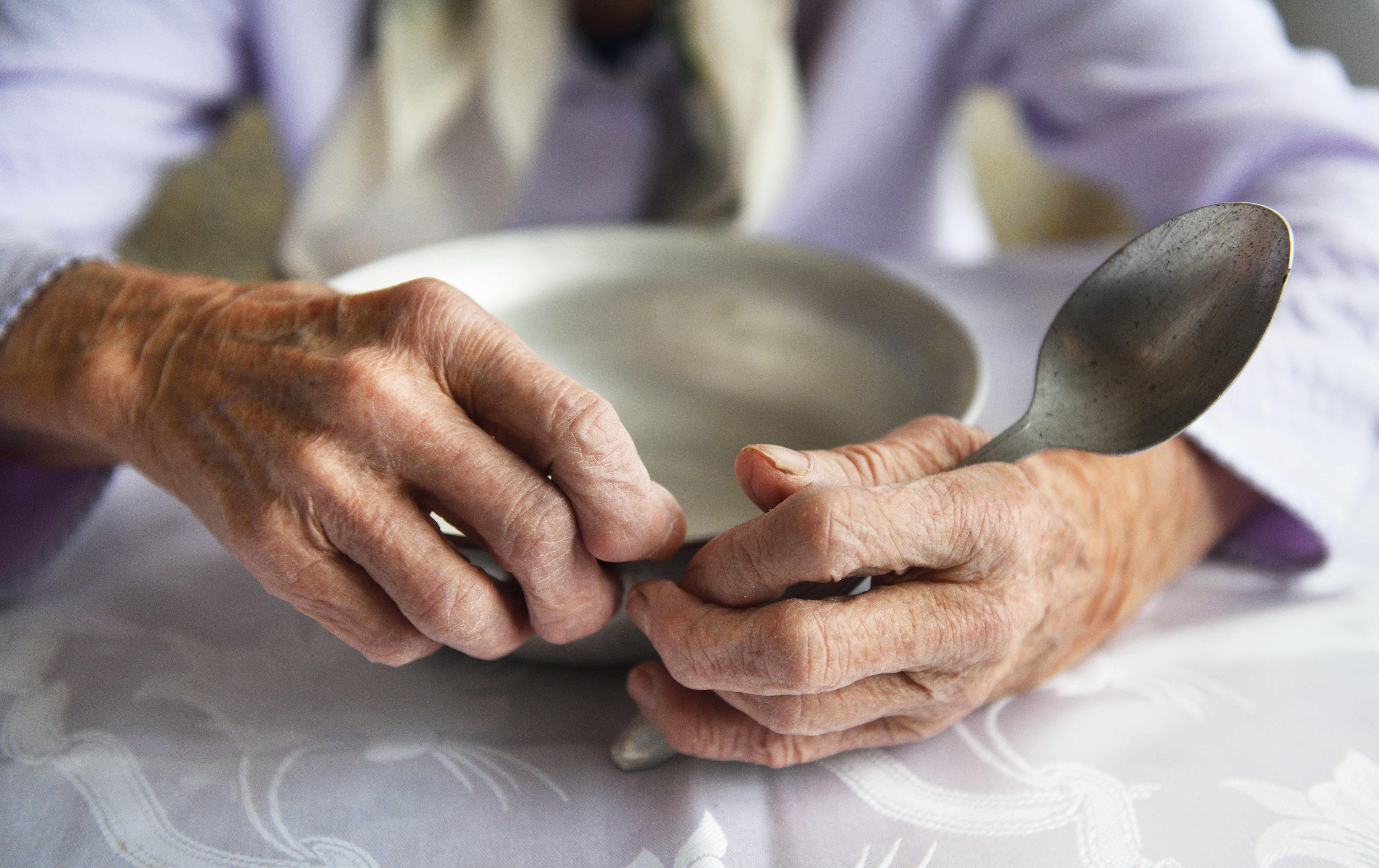 View from above.The hands of an old grandmother of 90 years are